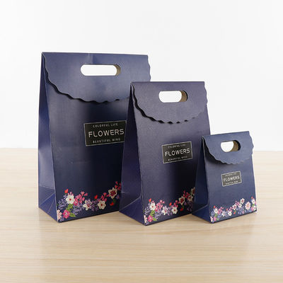 Spot UV / estampagem a quente bolsas de papel de compras de varejo doces doce bolsa de presente para crianças